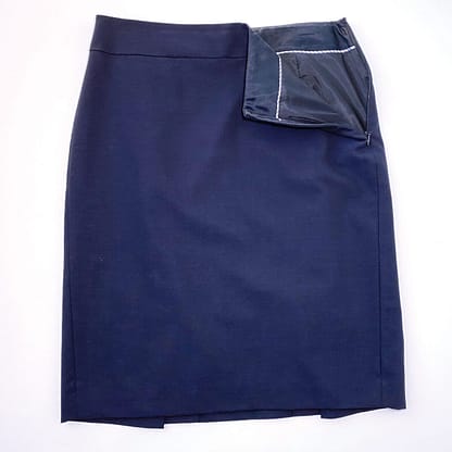 Pre-loved Banana Republic navy wool pencil skirt, women's size 4, knee-length, available at Capra & Quail.