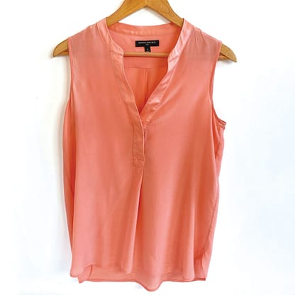 Pre-loved Banana Republic silk sleeveless blouse in peach/coral, size small, available at Capra & Quail.