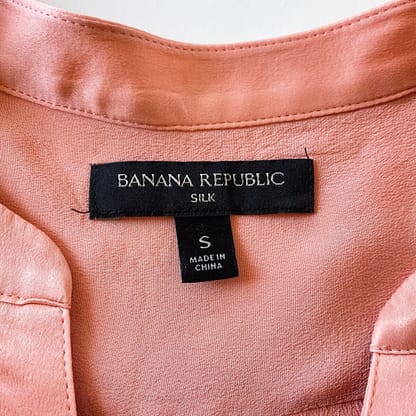 Vintage Banana Republic women's peach silk tank with closeup of label