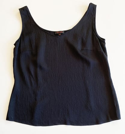 Front view of an Escada silk camisole in black, showing a slight v-neck neckline.