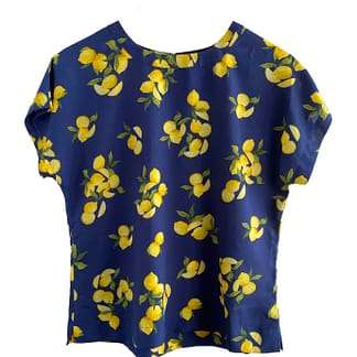 Pre-owned Banana Republic lemon print blouse, petite small, navy blue with yellow lemons, available at Capra & Quail.