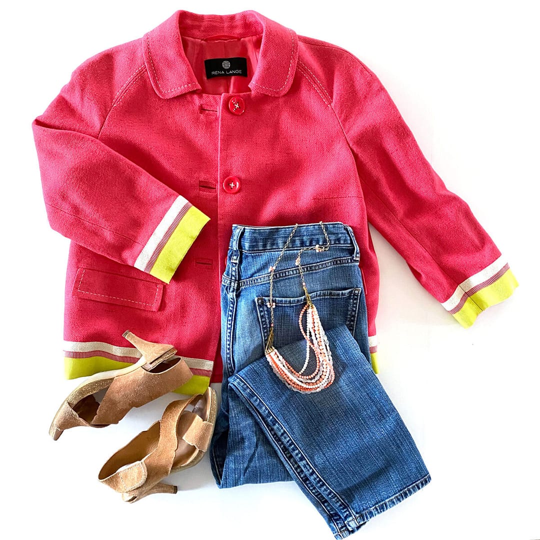 detail of Rena Lange silk jacket styled with jeans and heels